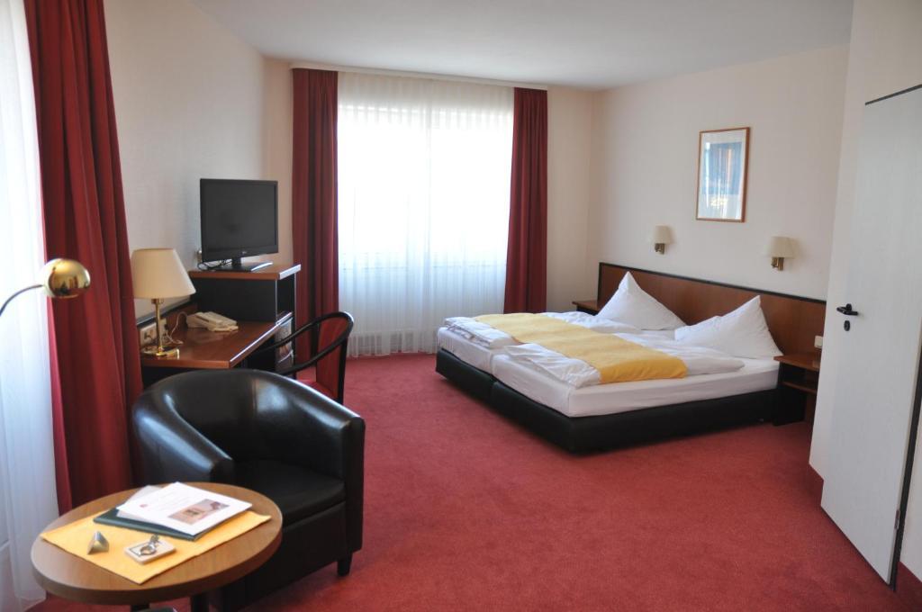 City Hotel อัสเชิร์สเลเบน ภายนอก รูปภาพ